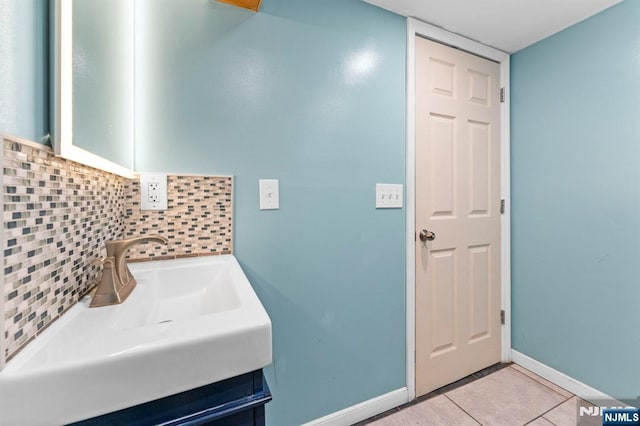 837 Keep St, Linden, NJ 07036 - bathroom with decorative backsplash, tile patterned flooring, and vanity