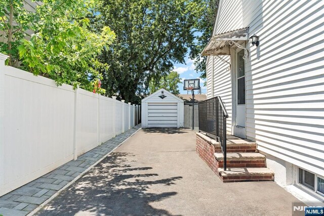 837 Keep St, Linden, NJ 07036 - view of patio with a storage shed