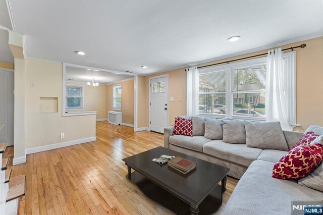 837 Keep St, Linden, NJ 07036 - living area featuring a chandelier, light wood finished floors, and recessed lighting
