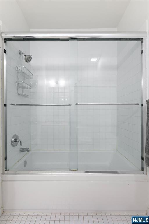 201 Marin Blvd Unit 1209, Jersey City, NJ 07302 - bathroom with bath / shower combo with glass door