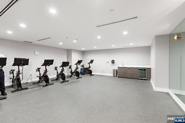201 Marin Blvd Unit 1209, Jersey City, NJ 07302 - workout area with wine cooler, bar with sink, and recessed lighting