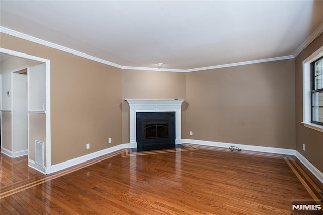 29 Concord Rd Unit F, West Milford, NJ 07480 - unfurnished living room featuring wood finished floors, ornamental molding, and a fireplace with flush hearth