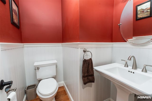 29 Concord Rd Unit F, West Milford, NJ 07480 - bathroom with a wainscoted wall and wood finished floors