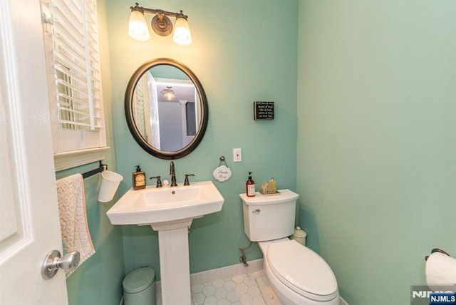 90 Warbler Dr, Wayne, NJ 07470 - half bathroom featuring toilet and tile patterned flooring