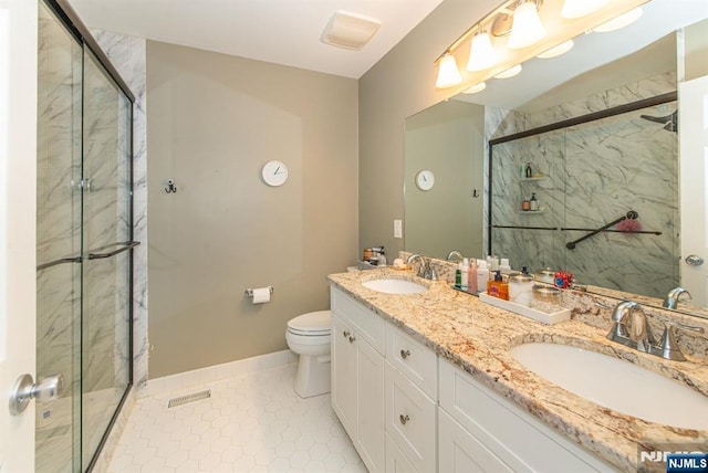 90 Warbler Dr, Wayne, NJ 07470 - bathroom with a marble finish shower, double vanity, and tile patterned floors