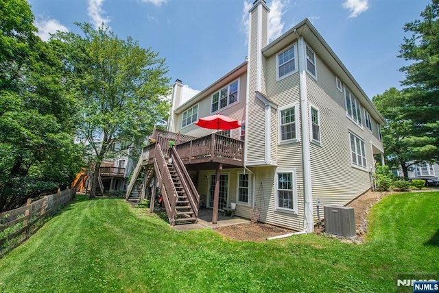 90 Warbler Dr, Wayne, NJ 07470 - rear view of property featuring a chimney, a deck, and stairway