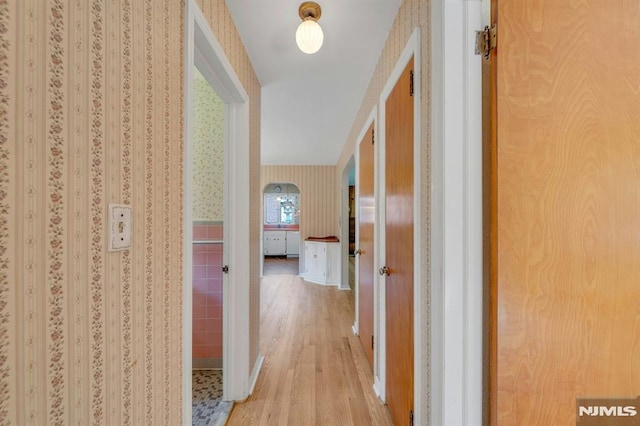 33 Ravine Dr, Hawthorne, NJ 07506 - hallway featuring wallpapered walls and light wood-style floors