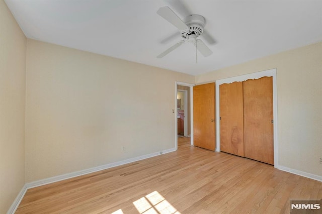 33 Ravine Dr, Hawthorne, NJ 07506 - unfurnished bedroom featuring light wood-style flooring, ceiling fan, and a closet