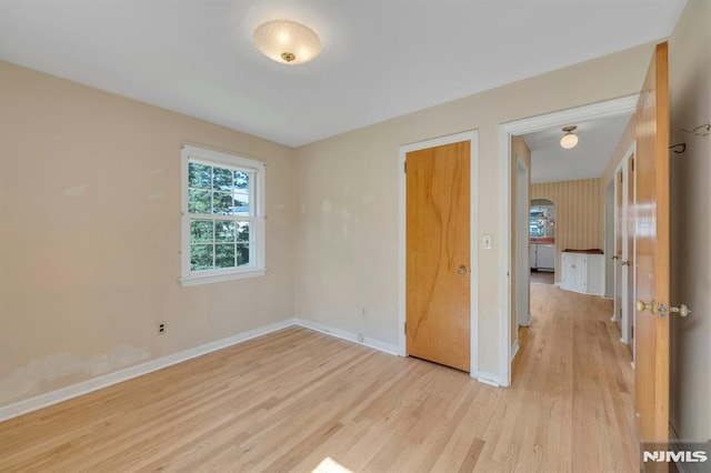 33 Ravine Dr, Hawthorne, NJ 07506 - unfurnished bedroom with light wood-style floors and baseboards
