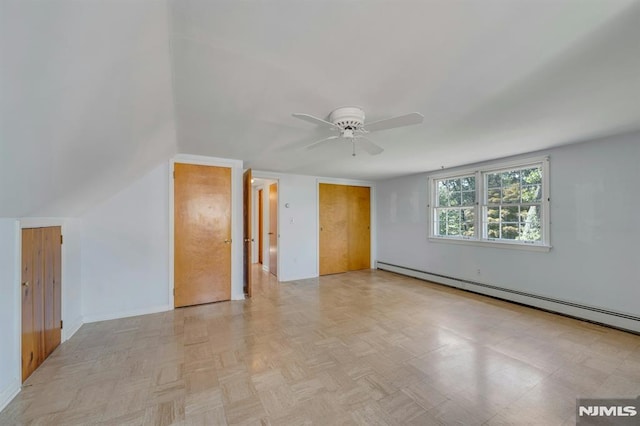 33 Ravine Dr, Hawthorne, NJ 07506 - unfurnished room with a baseboard heating unit and a ceiling fan