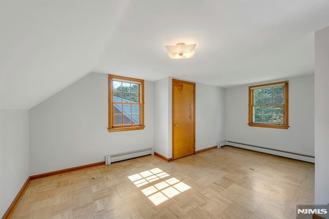 33 Ravine Dr, Hawthorne, NJ 07506 - additional living space with baseboard heating and vaulted ceiling