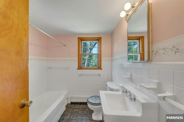 33 Ravine Dr, Hawthorne, NJ 07506 - full bathroom featuring tile walls, bathtub / shower combination, wainscoting, and baseboard heating