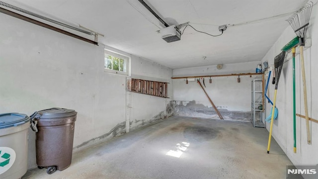 33 Ravine Dr, Hawthorne, NJ 07506 - garage featuring a garage door opener