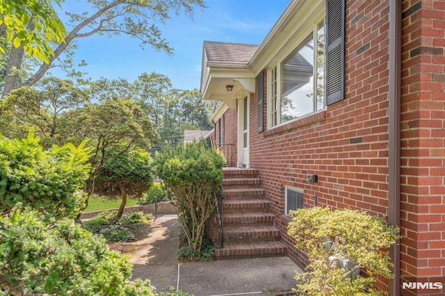 33 Ravine Dr, Hawthorne, NJ 07506 - doorway to property featuring brick siding