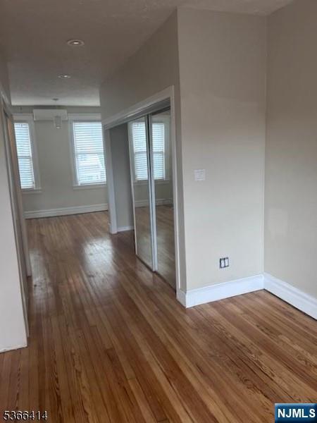 34 Voorhees St, Newark, NJ 07108 - empty room featuring baseboards and wood finished floors