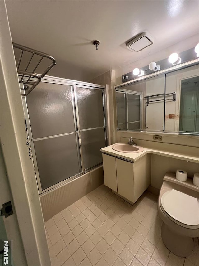 245 Prospect Ave Unit 5A, Hackensack, NJ 07601 - bathroom with tile patterned floors, combined bath / shower with glass door, and vanity