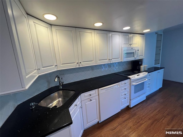245 Prospect Ave Unit 5A, Hackensack, NJ 07601 - kitchen with white appliances, white cabinetry, dark countertops, and recessed lighting