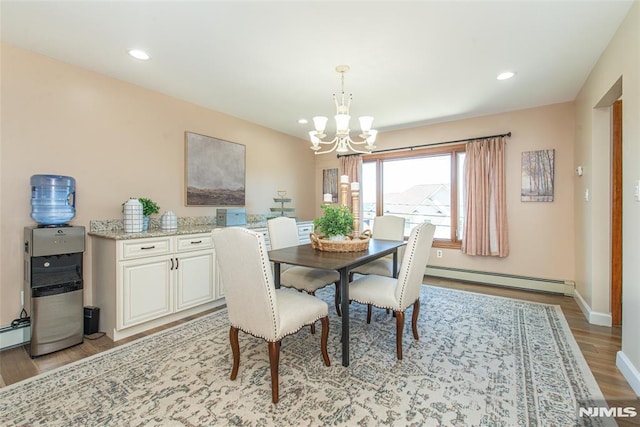 44 Columbus Ave, Totowa, NJ 07512 - dining space featuring a baseboard radiator, a chandelier, light wood-style floors, and recessed lighting