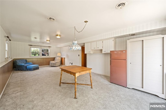 87 Larkspur Ln, Clifton, NJ 07013 - living room with wallpapered walls and light colored carpet