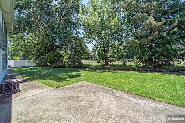 87 Larkspur Ln, Clifton, NJ 07013 - fenced backyard with a patio area