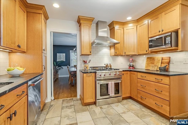 35 Hawthorne Ave, Glen Ridge, NJ 07028 - kitchen with stainless steel appliances, wall chimney range hood, dark countertops, backsplash, and recessed lighting