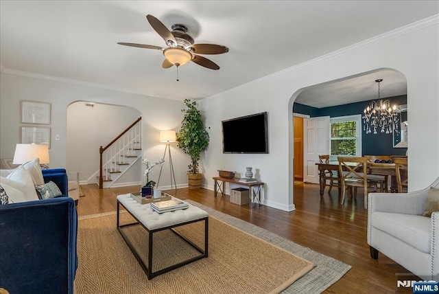 35 Hawthorne Ave, Glen Ridge, NJ 07028 - living area with arched walkways, stairway, a ceiling fan, wood finished floors, and crown molding