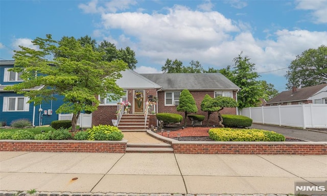 12 Moore Pl, Belleville, NJ 07109 - view of front facade featuring brick siding