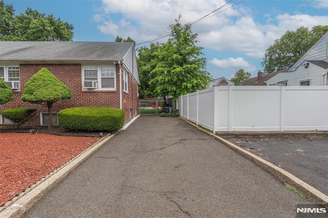 12 Moore Pl, Belleville, NJ 07109 - view of property exterior with brick siding and cooling unit