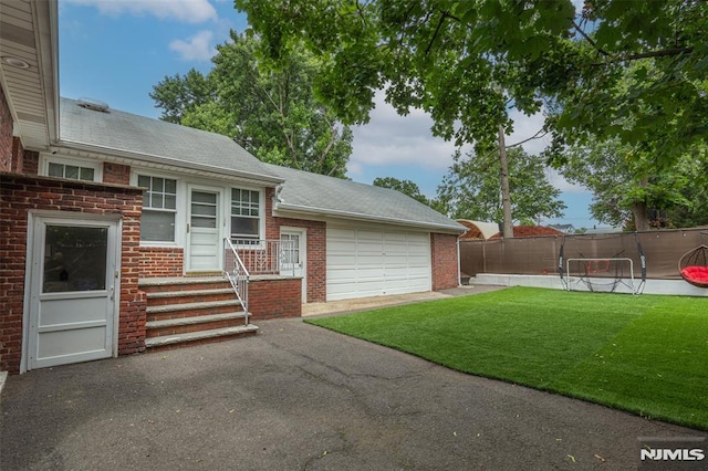 12 Moore Pl, Belleville, NJ 07109 - exterior space featuring asphalt driveway, an attached garage, and entry steps