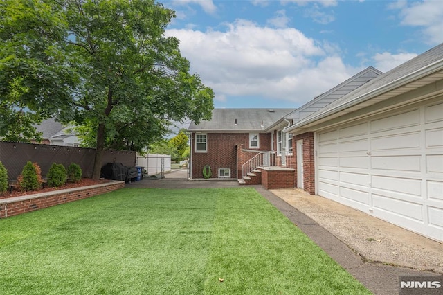 12 Moore Pl, Belleville, NJ 07109 - view of yard featuring asphalt driveway