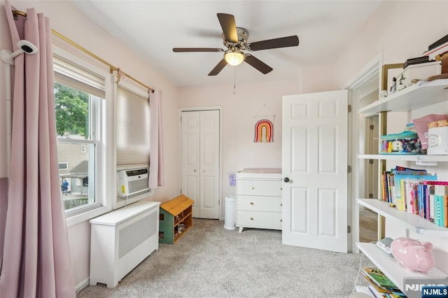 862 Lafayette Ave Extension, Hawthorne, NJ 07506 - sitting room featuring light colored carpet, radiator heating unit, ceiling fan, and cooling unit