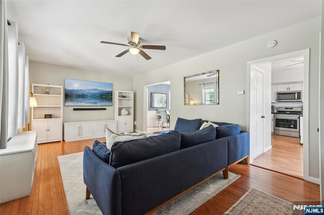 862 Lafayette Ave Extension, Hawthorne, NJ 07506 - living area featuring ceiling fan, wood finished floors, and built in shelves