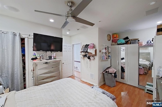 299 7th Ave, Newark, NJ 07107 - bedroom with light wood-style flooring, ceiling fan, and recessed lighting