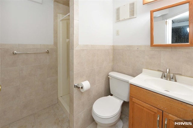 39 Mozart St, East Rutherford, NJ 07073 - full bath featuring tile walls, vanity, a shower stall, and a wainscoted wall
