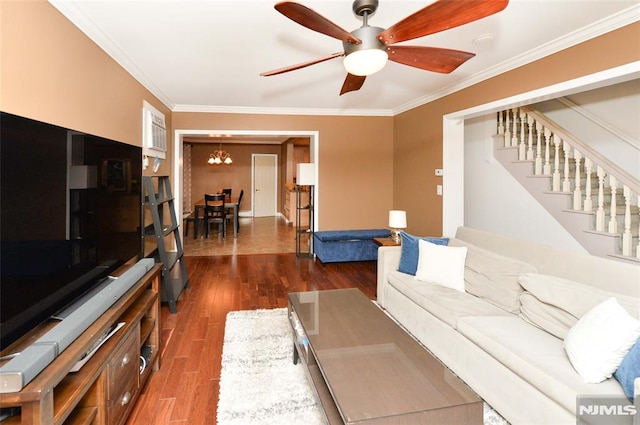 39 Mozart St, East Rutherford, NJ 07073 - living area featuring dark wood-style flooring, stairway, ornamental molding, ceiling fan, and a chandelier