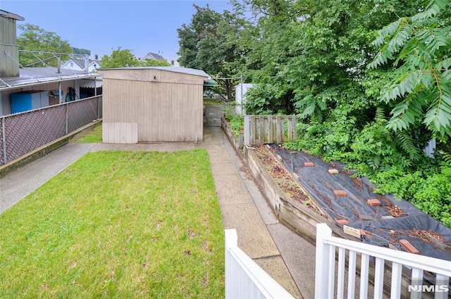 39 Mozart St, East Rutherford, NJ 07073 - view of yard featuring a storage shed and a garden
