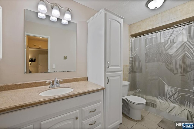 462 Liberty St Unit 109, Little Ferry, NJ 07643 - full bath with tile patterned floors, vanity, and a shower with shower curtain