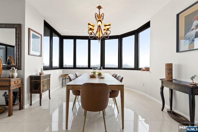 100 Carlyle Dr Unit 12K-S, Cliffside Park, NJ 07010 - dining space featuring light tile patterned flooring and a chandelier