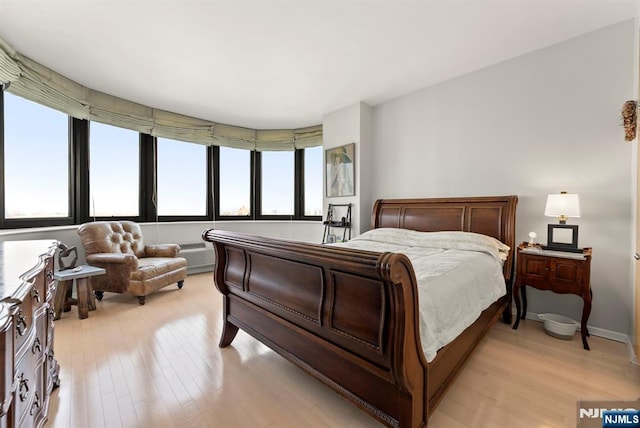100 Carlyle Dr Unit 12K-S, Cliffside Park, NJ 07010 - bedroom featuring light wood-type flooring