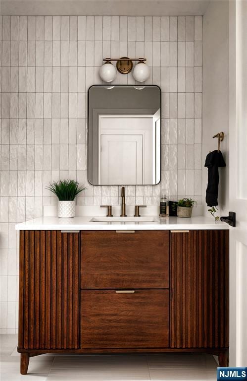 505 Darby Ct, Ridgewood, NJ 07450 - bathroom featuring tile walls, vanity, and tile patterned floors