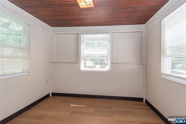 55 Rowland Ave, Hackensack, NJ 07601 - empty room featuring wood ceiling and wood finished floors