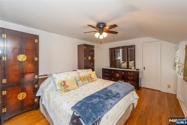 55 Rowland Ave, Hackensack, NJ 07601 - bedroom with wood finished floors, ceiling fan, and lofted ceiling