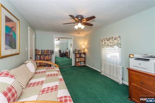 55 Rowland Ave, Hackensack, NJ 07601 - living room with radiator heating unit, a ceiling fan, and carpet