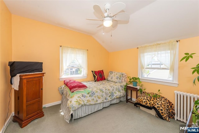 55 Rowland Ave, Hackensack, NJ 07601 - bedroom with radiator heating unit, carpet flooring, multiple windows, lofted ceiling, and a ceiling fan