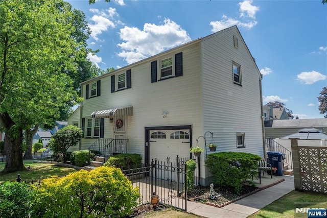 55 Rowland Ave, Hackensack, NJ 07601 - view of front of house featuring an attached garage