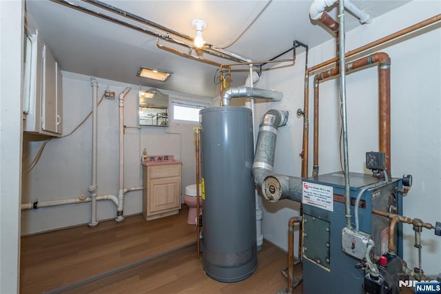 55 Rowland Ave, Hackensack, NJ 07601 - utility room with water heater and a heating unit