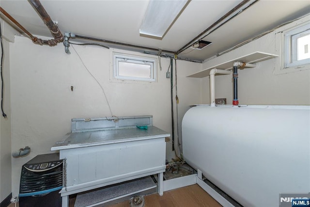 55 Rowland Ave, Hackensack, NJ 07601 - below grade area with oil tank and wood finished floors