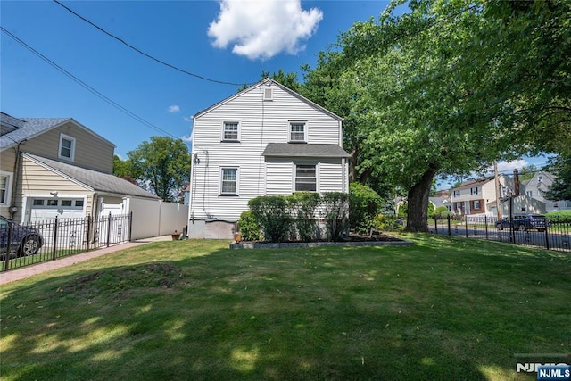 55 Rowland Ave, Hackensack, NJ 07601 - view of property exterior with a garage