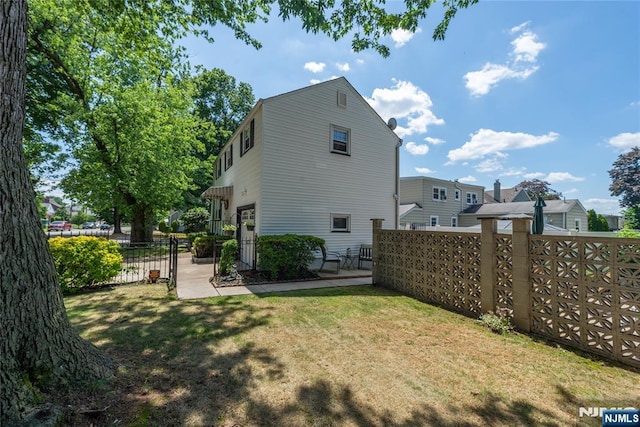 55 Rowland Ave, Hackensack, NJ 07601 - back of house featuring a patio area