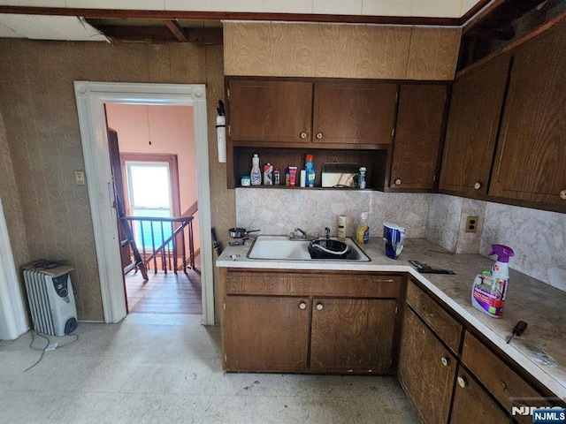 4311 Cottage Ave, North Bergen, NJ 07047 - kitchen featuring light countertops, tasteful backsplash, and open shelves